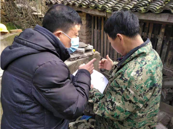 邻里纠纷只为墙，工作队调解帮大忙