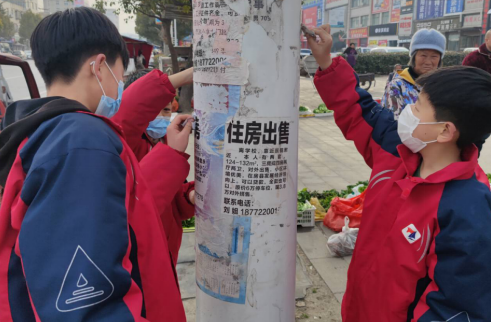 七河中学开展“学雷锋，树新风”志愿活动