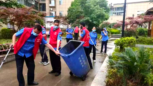 【创文进行时】城管蓝辉映志愿红 调出文明新底色
